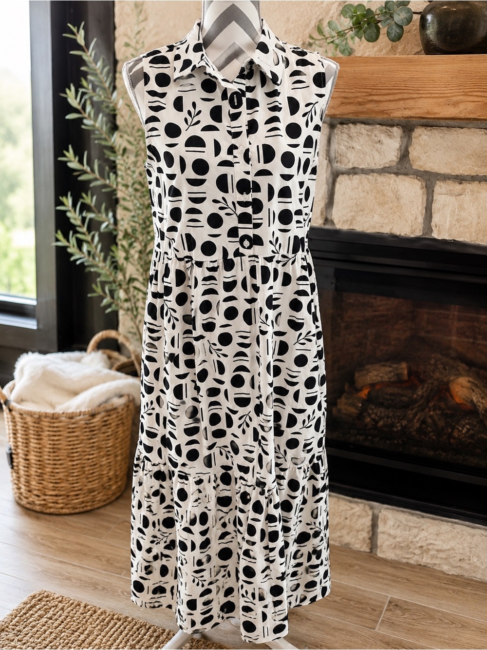 Rachel Zoe is a sleeveless cotton-blend midi dress featuring a bold black